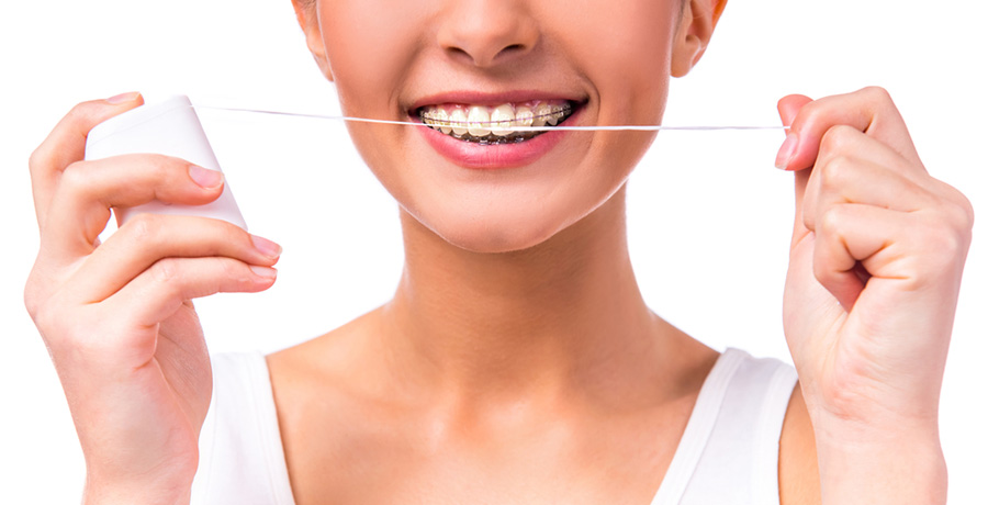 https://baysidedental.dreamhosters.com/wp-content/uploads/2018/01/ten-tips-for-keeping-your-braces-clean-1.jpg